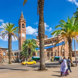 asmara Pedestrians walk in front of the Church of Our Lady of the Rosary in central Asmara, the capital of Eritrea, East Africa on a sunny day.